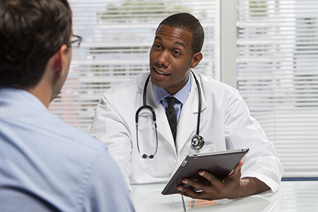 Doctor attending a patient, covered by medical indemnity